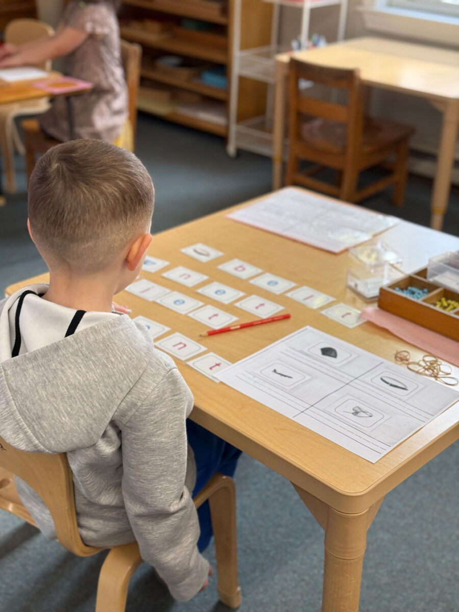 Kindergarten student working on word formation