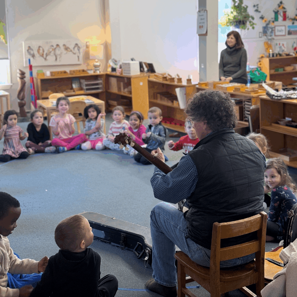 Students enjoying singing and dancing with Hugh Hanley